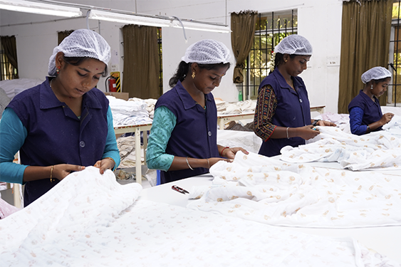 Workers in Factory producing Sustainable Fabrics