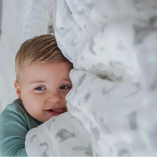Child and Muslin Swaddle