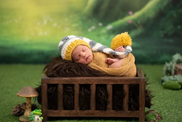 Baby Asleep in Tiny Cot